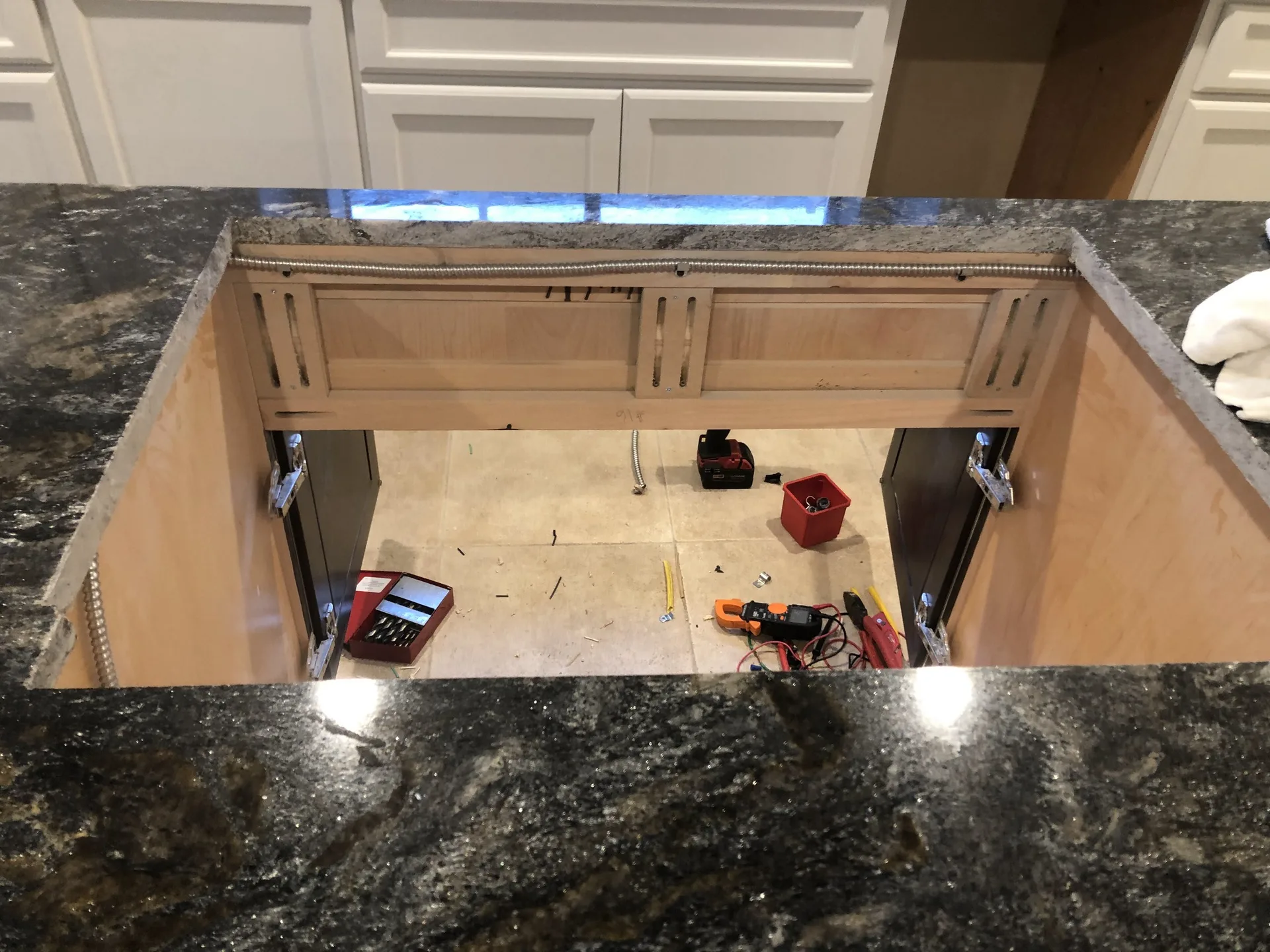 Under-cabinet lighting installed beneath kitchen cabinets.