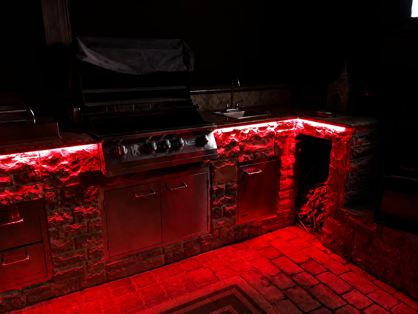 Outdoor lighting project with warm light around a finished exterior space