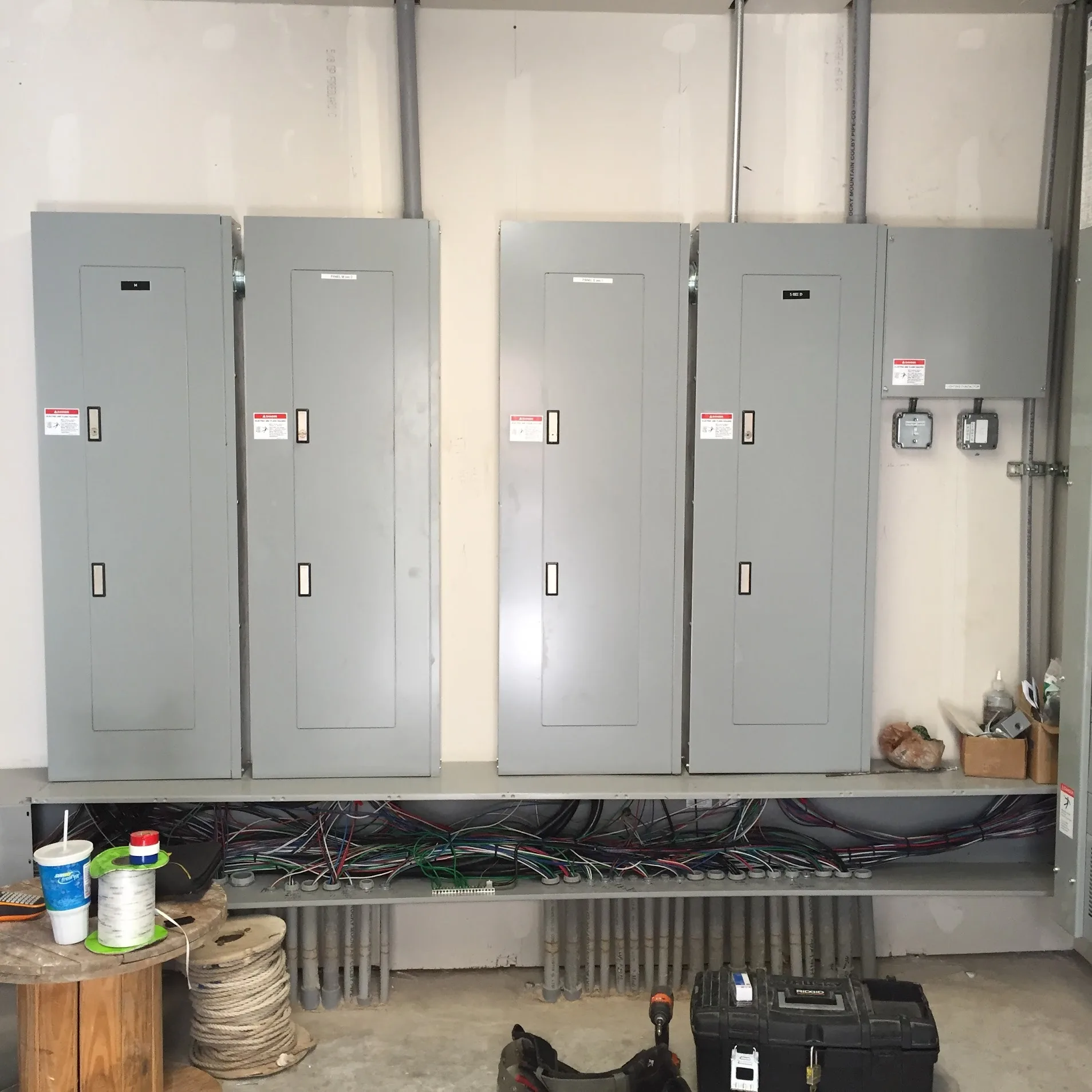 Electrical work being planned and installed for a construction project