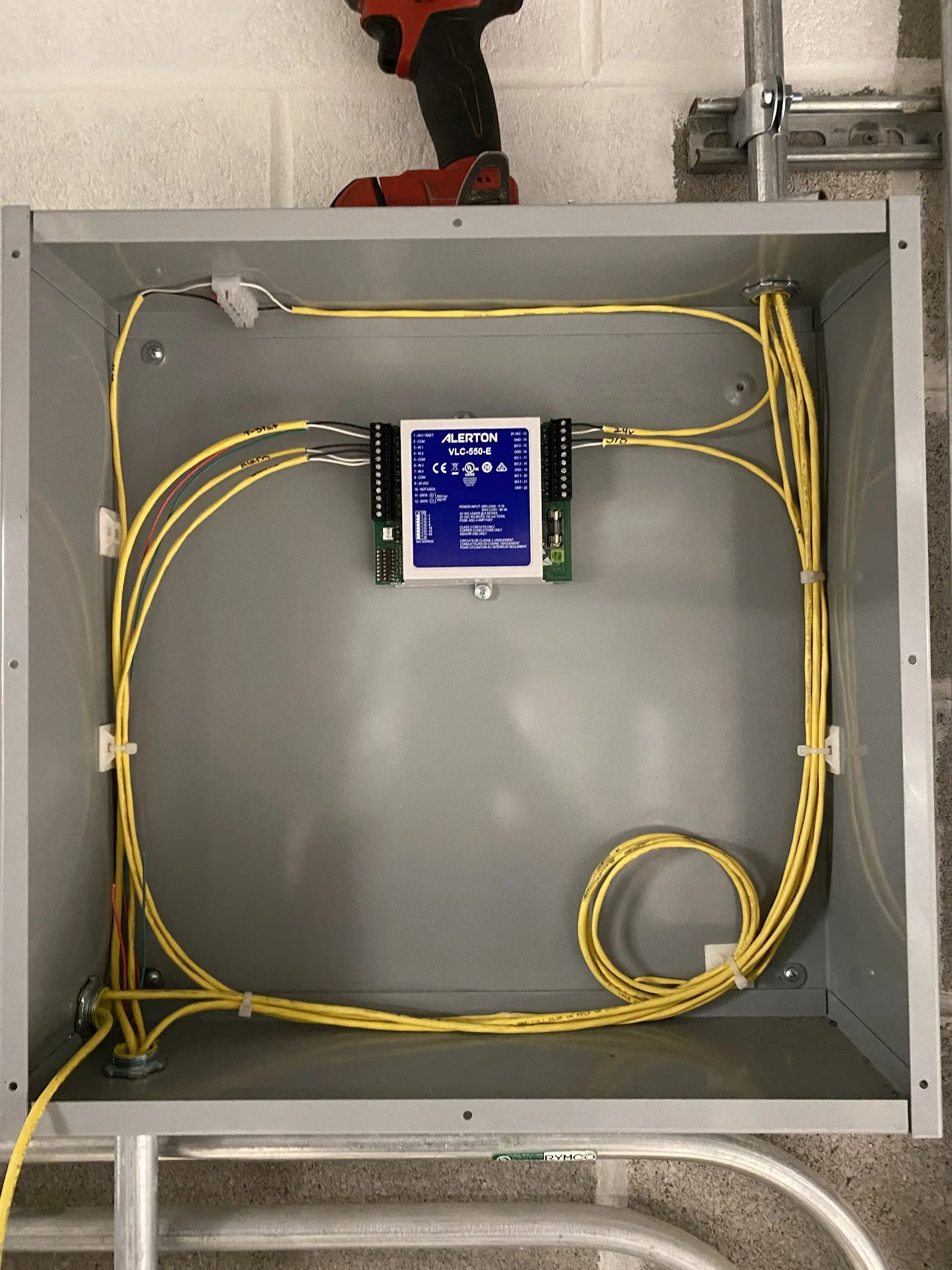 Low-voltage wiring arranged neatly inside a control enclosure.